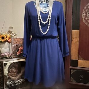 Miami Dress-royal blue, lined, with a fitted, flowy, & flare style.
